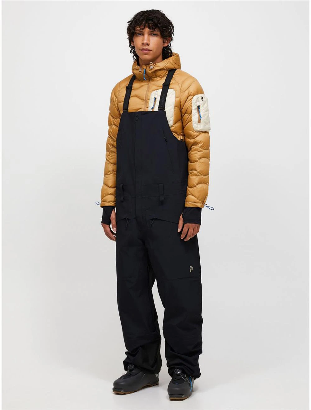 That is a Snowboard Pants; Ski Pants; Peak Performance M Edge 3L Bib Pants Black Black